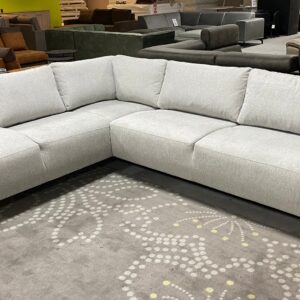 Salon d’angle en tissus gris clair